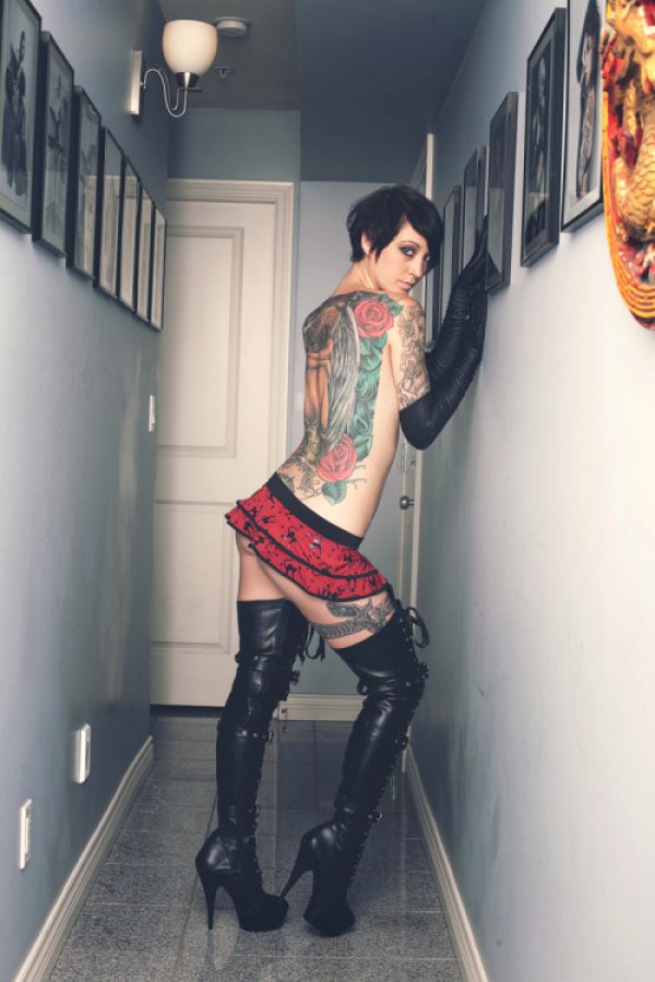 Inked Beauty In Boots And Gloves